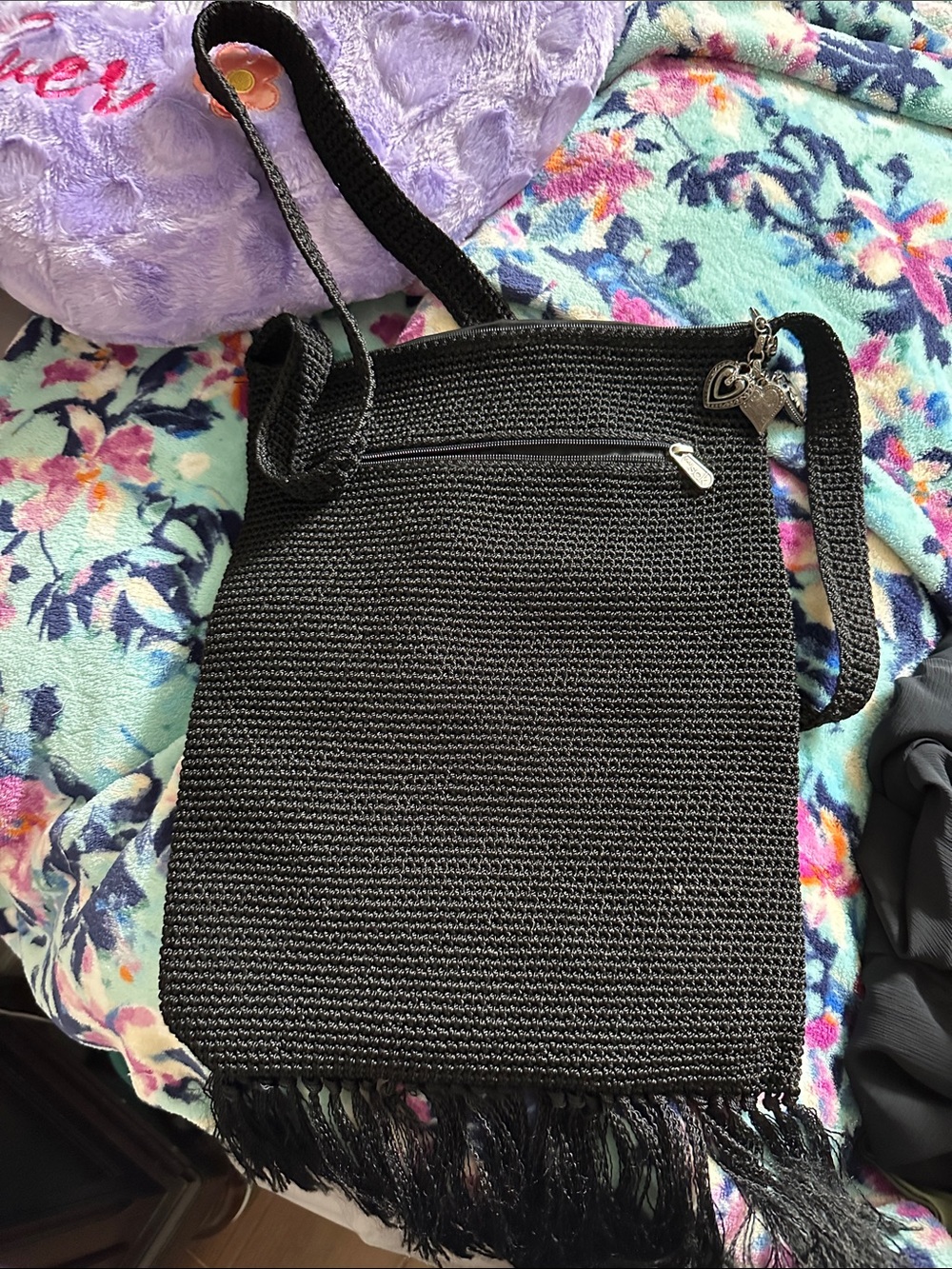 The Sak Black Woven Fringe Crossbody with Charm Accent